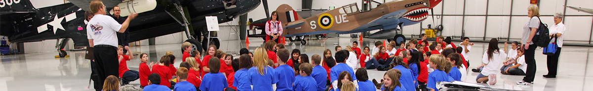 Docent lead tour as part of the Warhawk Air Museum education center for a school field trip