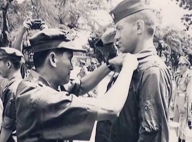 real life superhero, Soapy Walborn, receiving his Vietnamese Medal of Honor